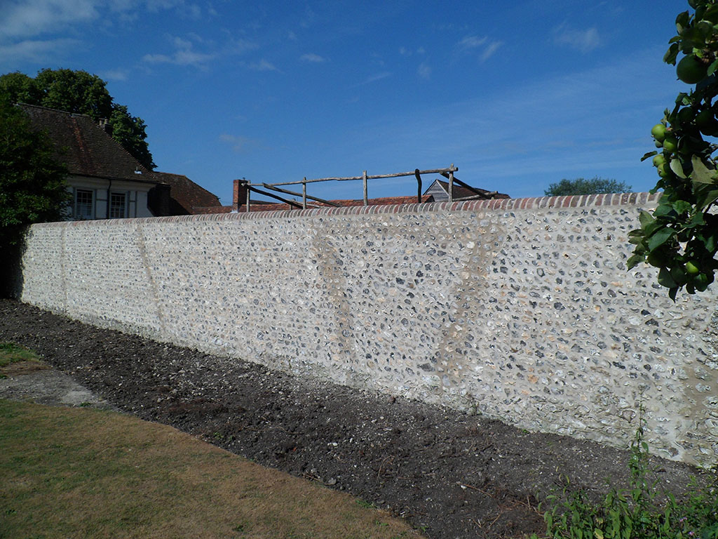 Flint, brick, chalk cob boundary wall care and repair hampshire